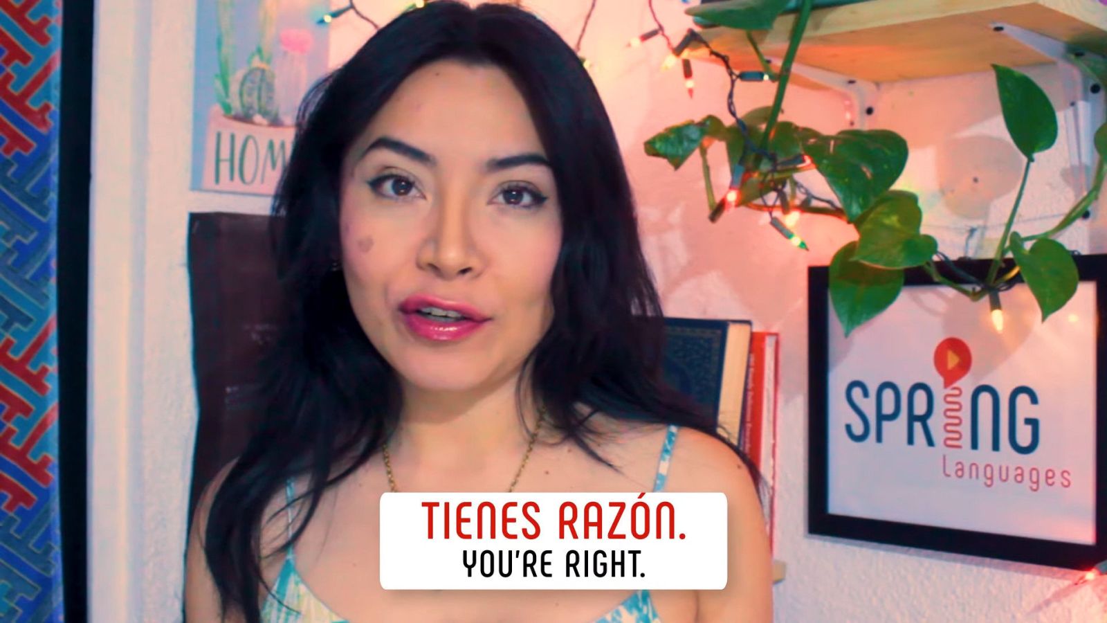 how to fight in spanish video screenshot, female teacher explaining common spanish phrases