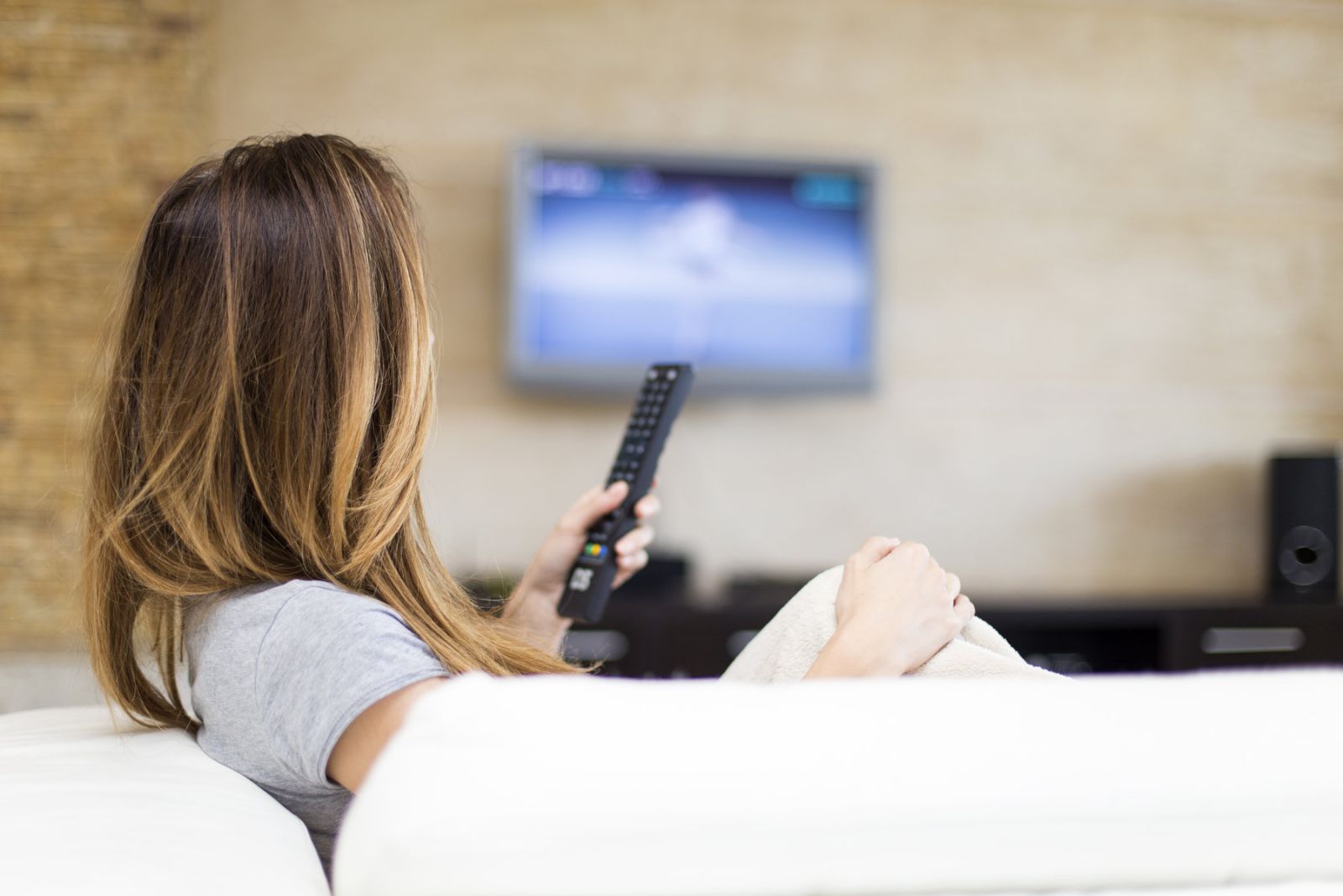 tv show in spanish woman looking at television