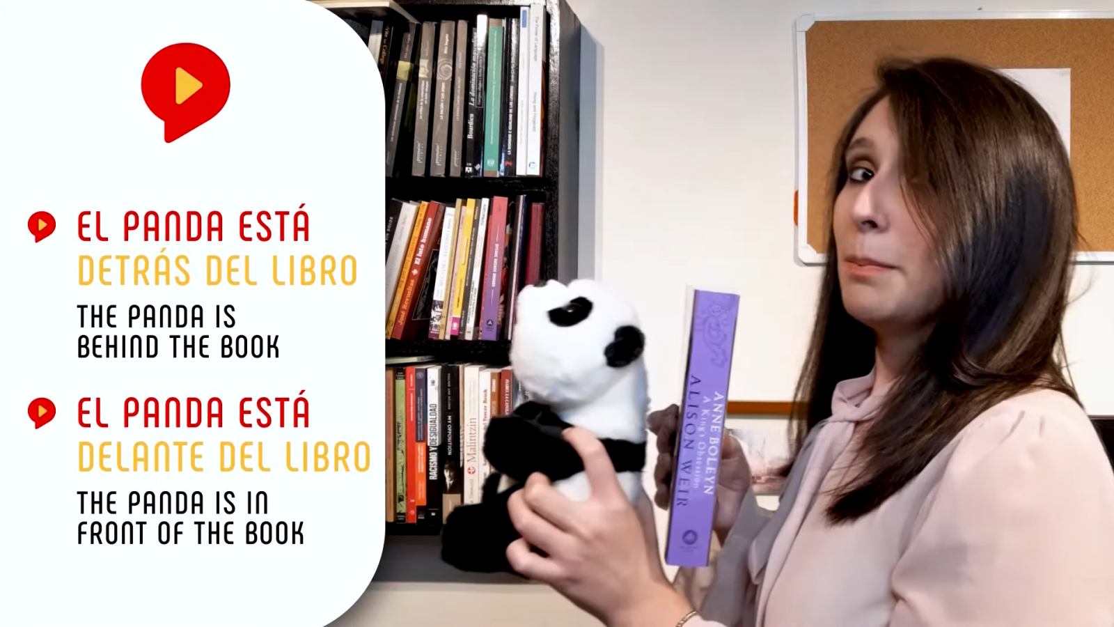 female teacher showing prepositions of location in spanish